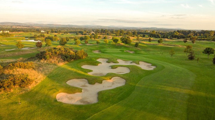 greens and sandy dunes on golf course